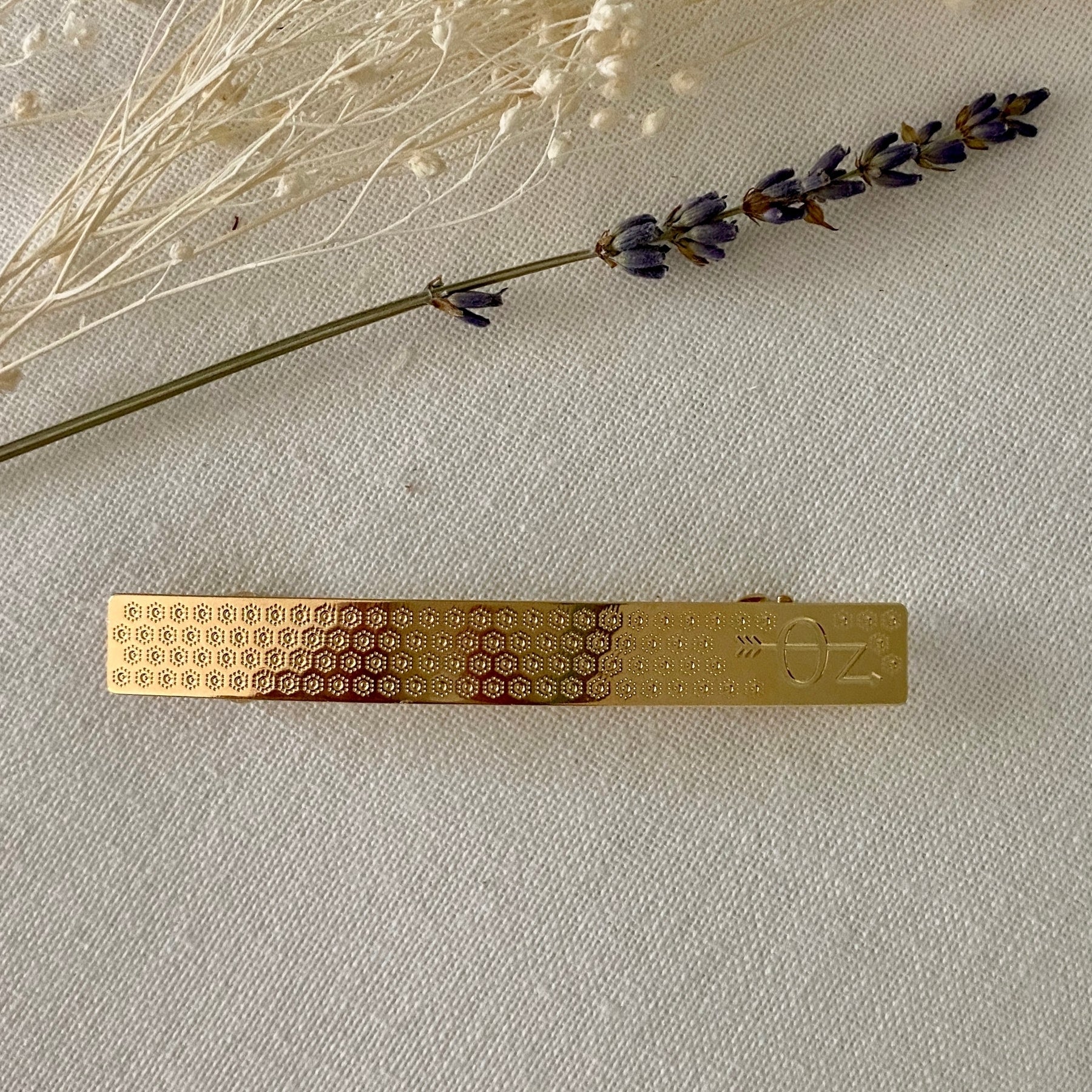 BARRETTE DOREE AVEC DECOR PETITES FLEURS