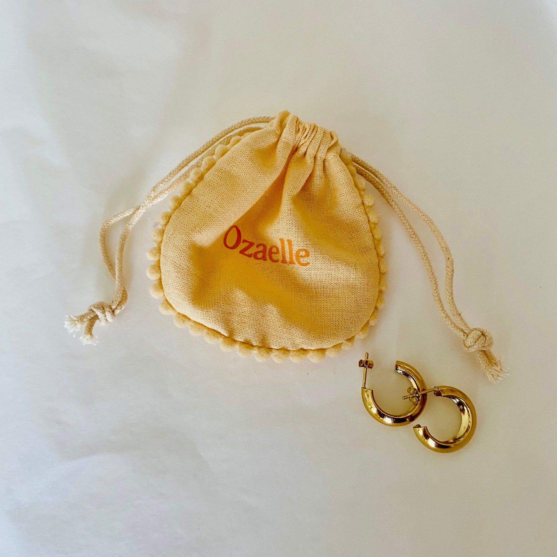 Large gold Augustine hoop earrings